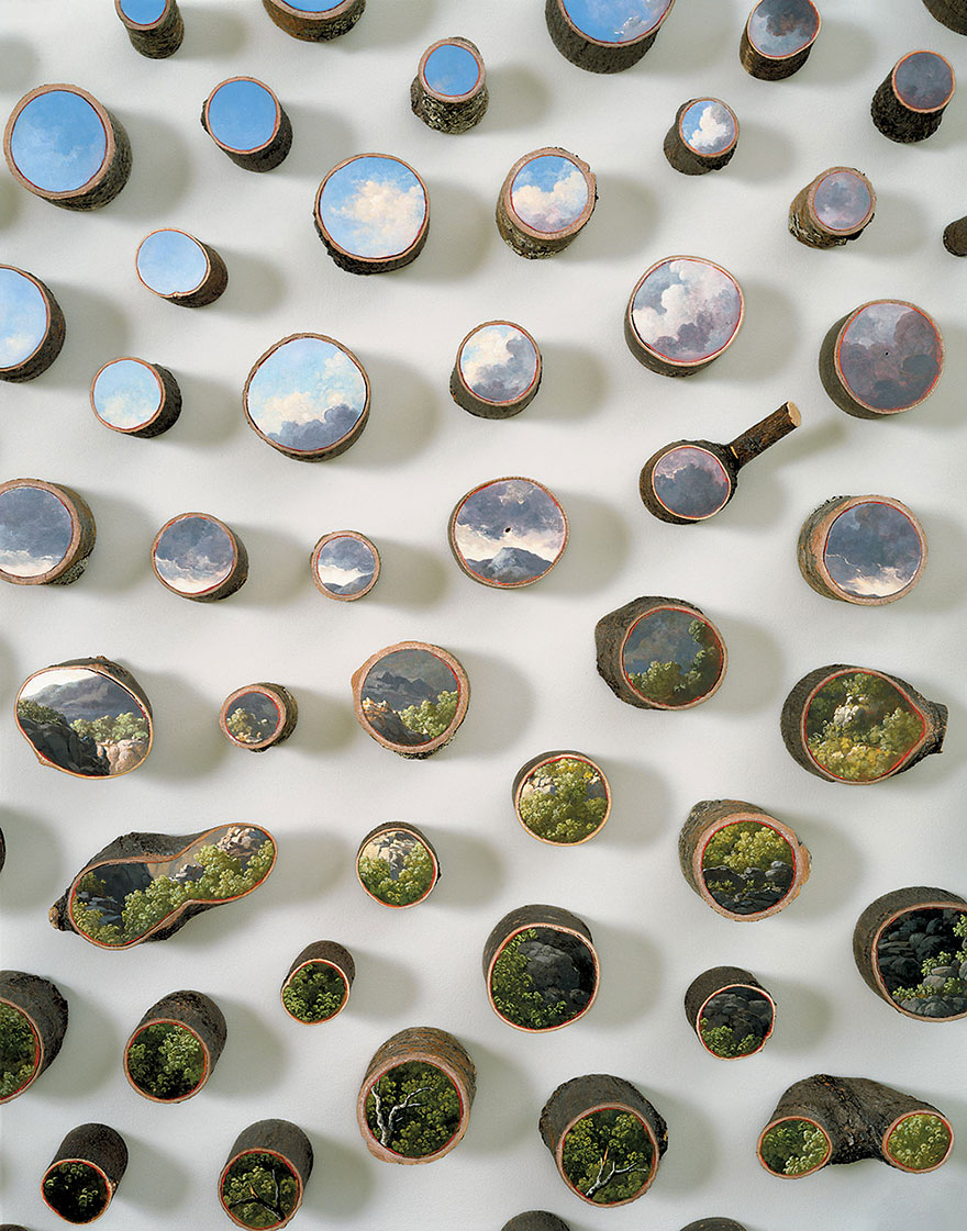 Пейзажи на срубленных деревьях, рисунки на пнях