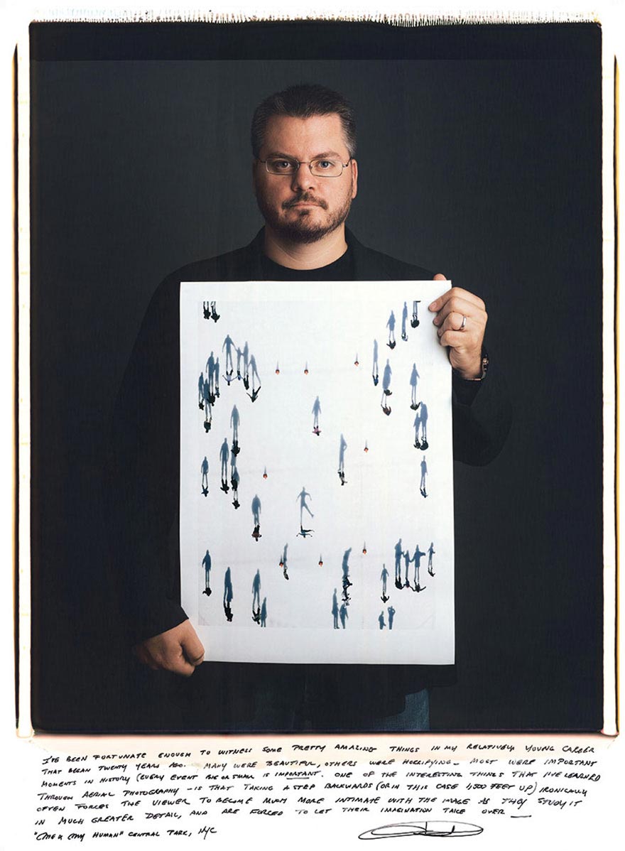 Фотографы позируют со своими знаковыми работами, которые принесли им всемирную славу Фотографы позируют со своими знаковыми работами, Тим Мантоани, Tim Mantoani, Behind Photographs