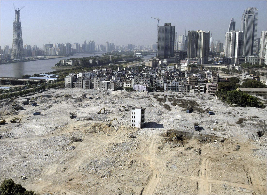 китайцы отказались сносить дом, китайские домовладельцы отказались сносить дом, не сносят дом в китае