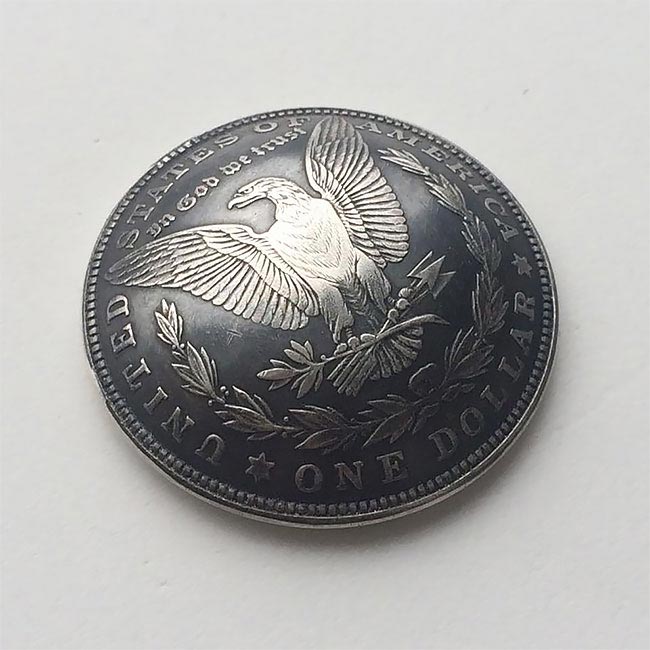 Российский умелец создал серебряный доллар-ловушку, который реально кусается доллар-ловушка, ловушка из доллара, доллар кусается, доллар с зубами