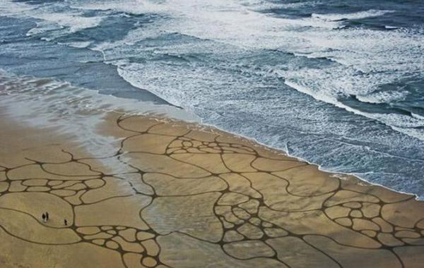 Рисунки художника на песке Андреса Амадора
