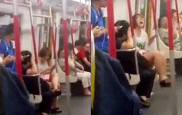 истерика из-за севшей батареи, китаянка устроила истерику в метро из-за севшей батареи, китаянка метро села батарея истерика