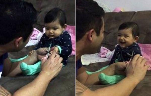 девочка пугает папу плачем, девочка кричит папа пытается подстричь ногти, девочка разыграла папу